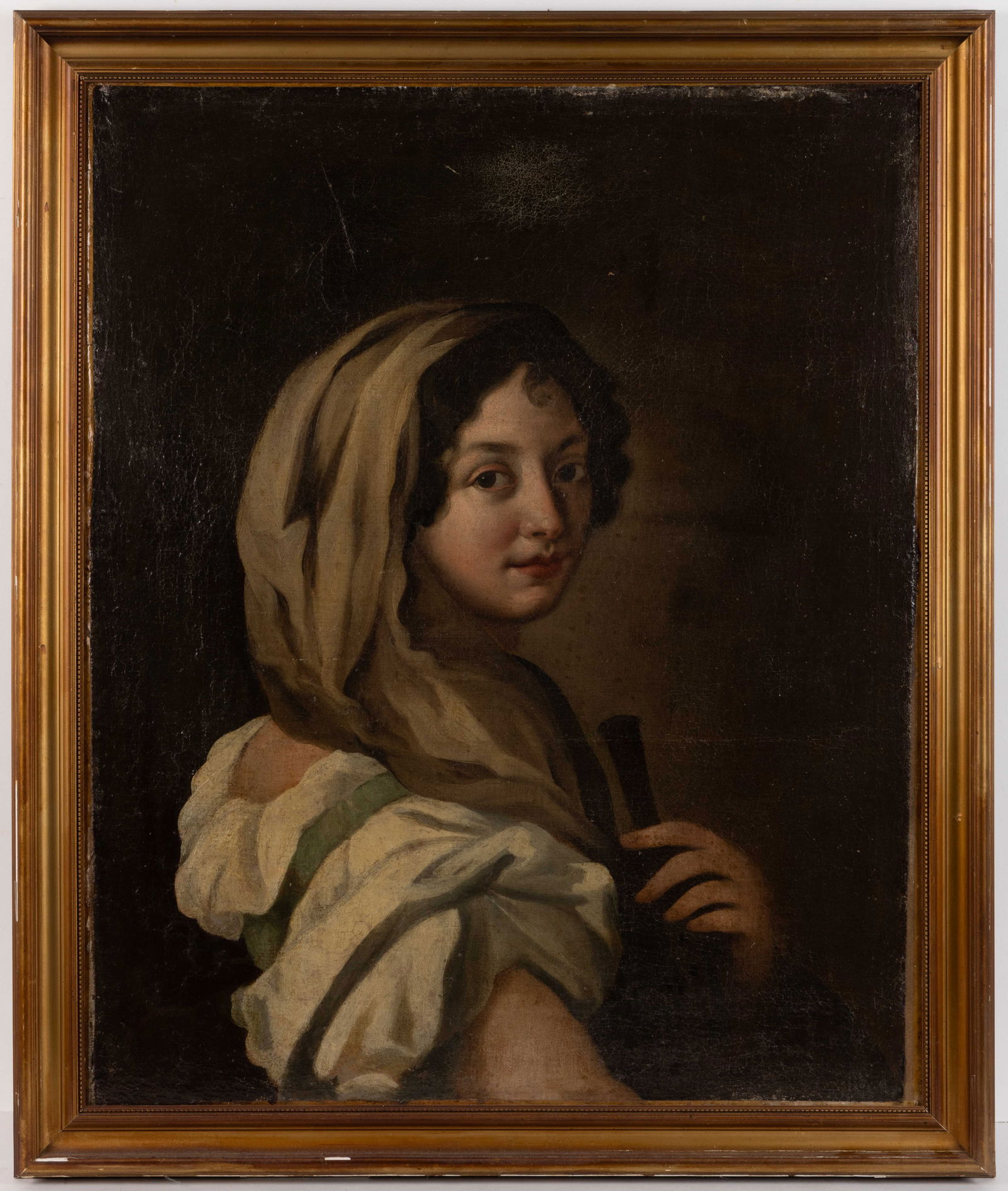 CONTINENTAL SCHOOL (18TH CENTURY) PORTRAIT OF A WOMAN: CONTINENTAL SCHOOL (18TH CENTURY) PORTRAIT OF A WOMAN, oil on canvas, a bust length depiction of a woman dressed in a white dress with puffed shoulders and a head scarf. Housed in a 20th century gilt