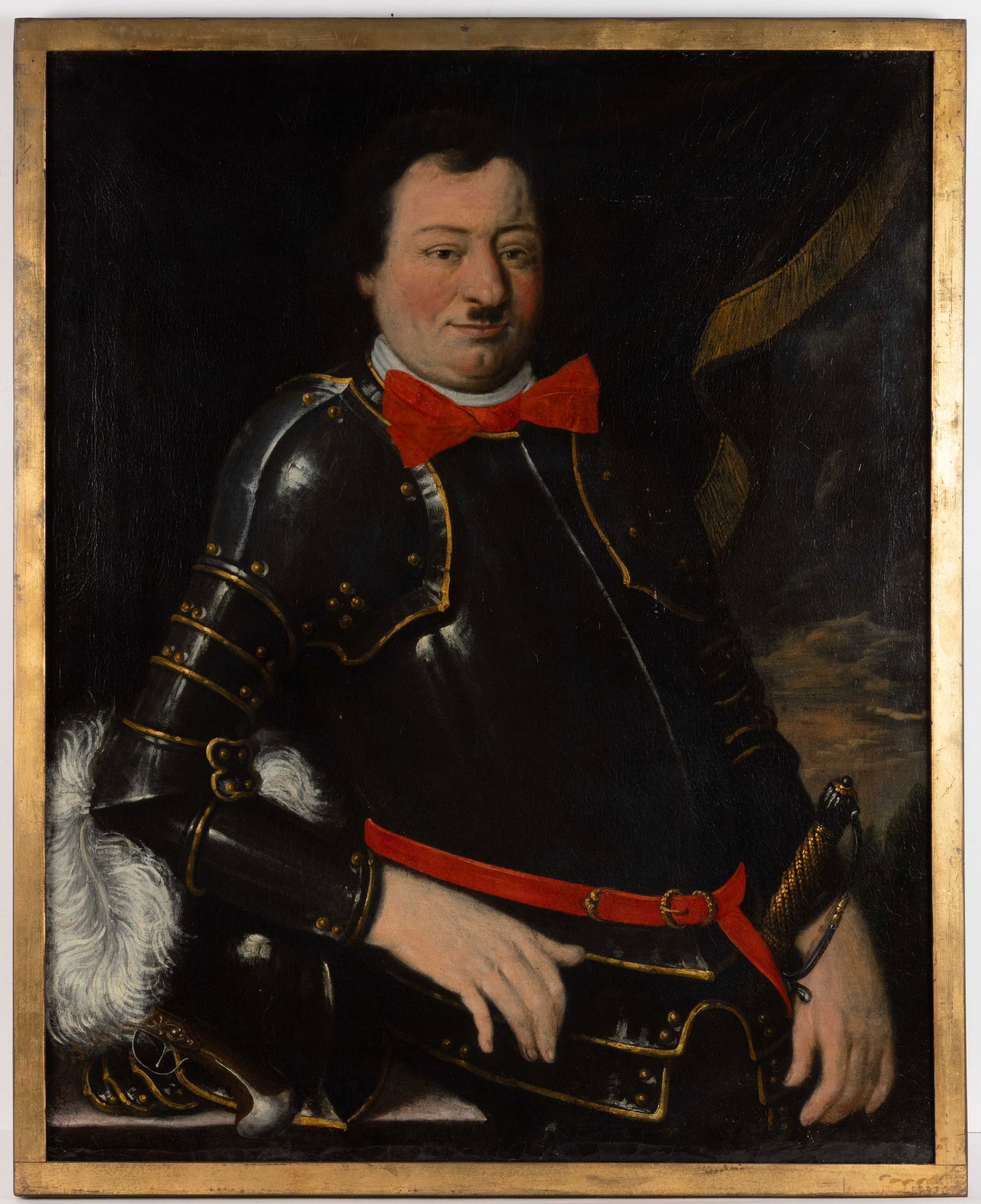 CONTINENTAL SCHOOL (19TH CENTURY) PORTRAIT OF A MILITARY MAN: CONTINENTAL SCHOOL (19TH CENTURY) PORTRAIT OF A MILITARY MAN, oil on canvas, depicting a rather rotund man with brown hair and a short mustache dressed in armor with red accessories, his helmet w