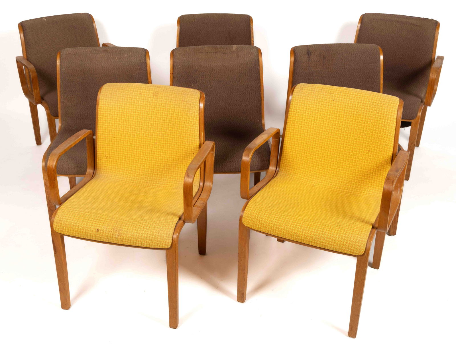 BILL STEPHENS FOR KNOLL INTERNATIONAL MID-CENTURY MODERN BENTWOOD CHAIRS, SET OF EIGHT: BILL STEPHENS FOR KNOLL INTERNATIONAL MID-CENTURY MODERN BENTWOOD CHAIRS, SET OF EIGHT, comprising four side chairs and four arm chairs, each with purplish-brown or yellow/orange upholstery, most