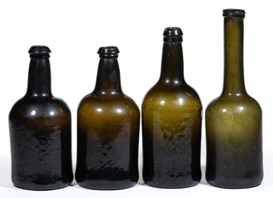 EUROPEAN FREE-BLOWN CYLINDRICAL BLACK GLASS UTILITY BOTTLES, LOT OF FOUR