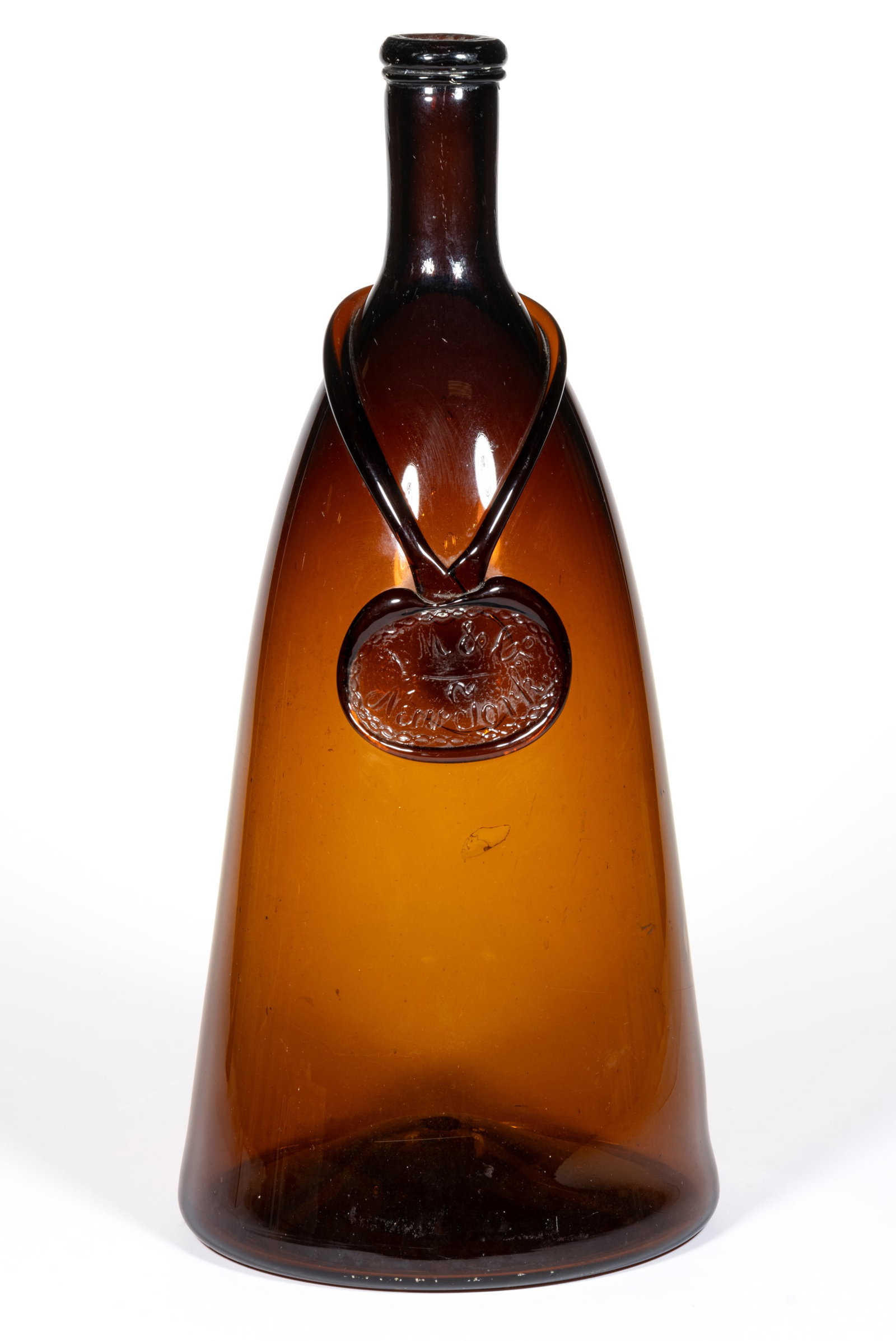 L.M.& CO., NEW YORK, OVERSIZED APPLIED SEAL WHISKEY BOTTLE: L.M.& CO., NEW YORK, OVERSIZED APPLIED SEAL WHISKEY BOTTLE, amber, cylindrical/inverted cone-form with a large oval applied seal embossed "L. M. CO. / New York" in script, with an applie
