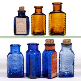 ASSORTED TRIANGULAR-FORM POISON BOTTLES, LOT OF SEVEN