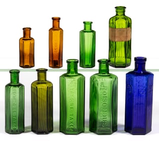 ASSORTED HEXAGONAL-FORM POISON BOTTLES, LOT OF NINE