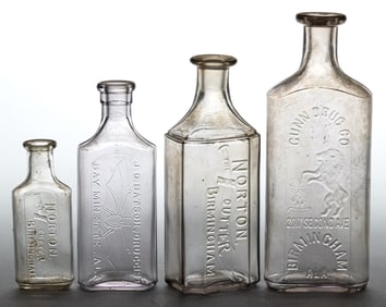 ALABAMA PICTORIAL EMBOSSED MEDICINE / DRUGGIST BOTTLES, LOT OF FOUR