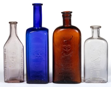 ASSORTED PICTORIAL PATENT MEDICINE / DRUGGIST BOTTLES, LOT OF FOUR