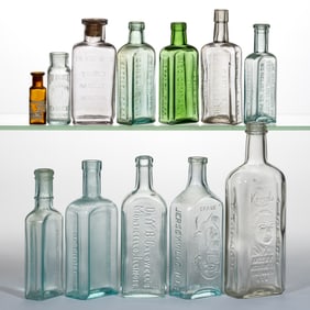 ASSORTED EMBOSSED PATENT MEDICINE / APOTHECARY BOTTLES, LOT OF 12