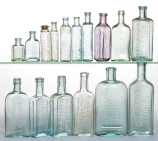 ASSORTED EMBOSSED PATENT MEDICINE / APOTHECARY BOTTLES, LOT OF 16