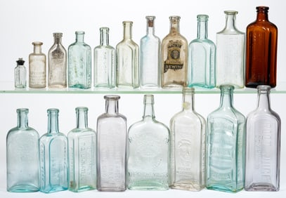 ASSORTED EMBOSSED PATENT MEDICINE / APOTHECARY BOTTLES, LOT OF 19