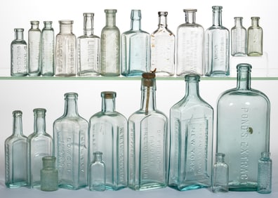 ASSORTED EMBOSSED PATENT MEDICINE / APOTHECARY BOTTLES, LOT OF 23