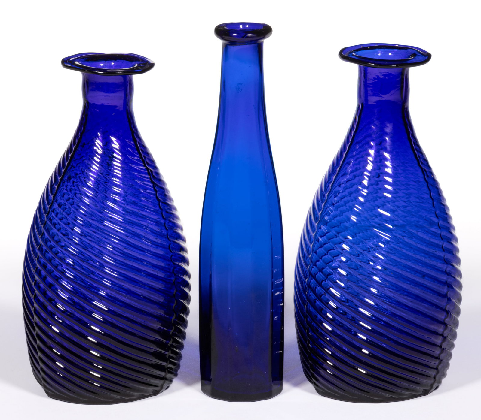 ASSORTED BLOWN-MOLDED COMMERCIAL COLOGNE / TOILET BOTTLES, LOT OF THREE: ASSORTED BLOWN-MOLDED COMMERCIAL COLOGNE / TOILET BOTTLES, LOT OF THREE, cobalt blue, comprising one small 12-sided paneled cologne/perfume and a pair of GI-3 Type 2 so-called "toilet&n