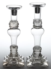 FREE-BLOWN AND PRESSED NEAR PAIR OF CANDLESTICKS