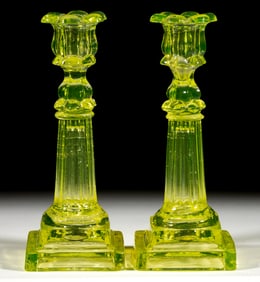 PRESSED PETAL AND COLUMNAR PAIR OF CANDLESTICKS