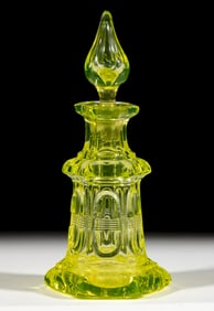 ELONGATED LOOP WITH BISECTING LINES COLOGNE BOTTLE