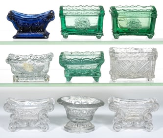 PRESSED LACY-ERA GLASS OPEN SALTS, LOT OF NINE