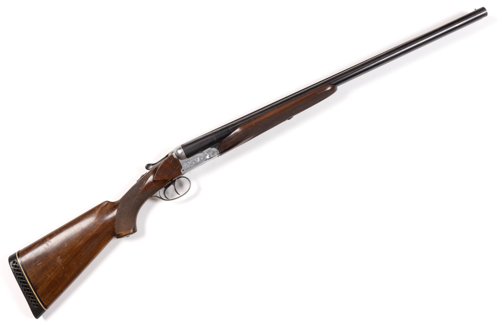 ITALIAN P. BERETTA SILVER HAWK DOUBLE-BARREL SHOTGUN: ITALIAN P. BERETTA SILVER HAWK DOUBLE-BARREL SHOTGUN, 12 gauge, engraved silvered frame, checkered walnut stock, stamped with three and four stars to the underside of barrels. Serial number: C35649. C