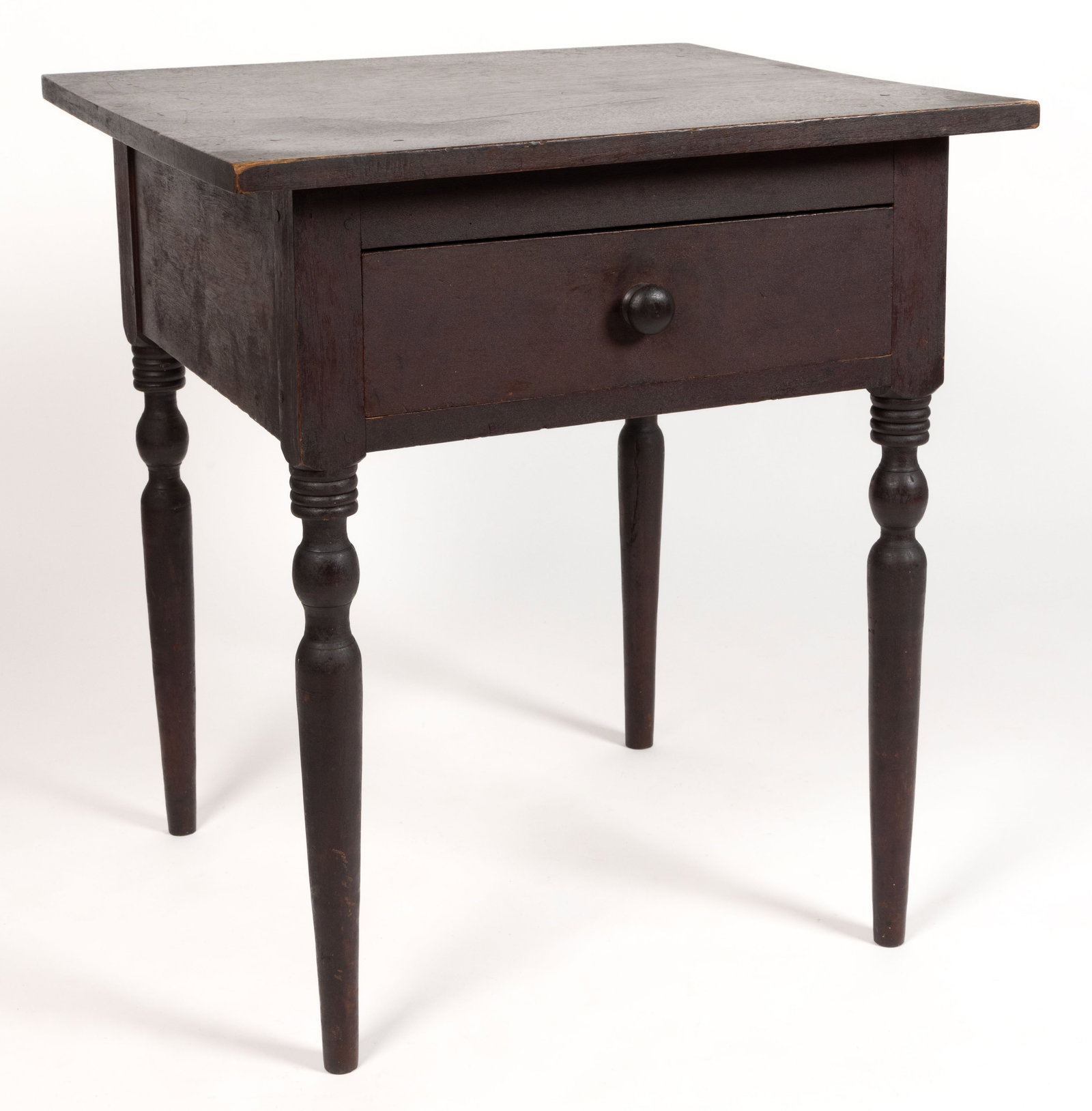 MID-ATLANTIC LATE FEDERAL WALNUT STAND TABLE: MID-ATLANTIC LATE FEDERAL WALNUT STAND TABLE, the rectangular overhanging top over a plain apron, one side with a single full drawer, the whole raised on turned legs which issue from the stile. Retain