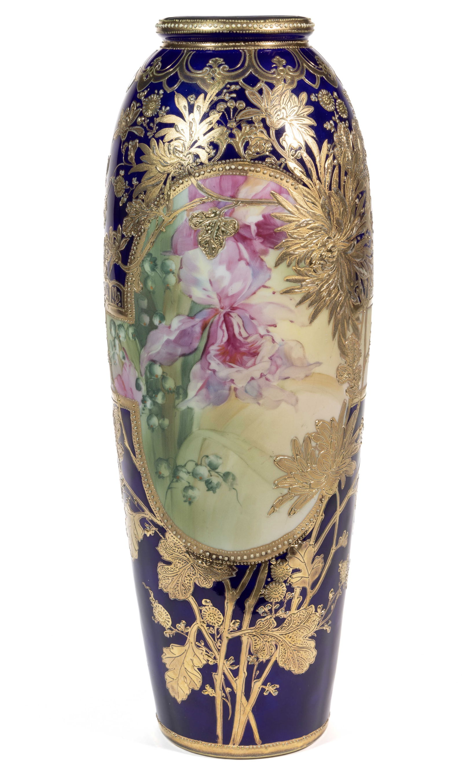 JAPANESE NIPPON COBALT PORCELAIN LARGE VASE: JAPANESE NIPPON COBALT PORCELAIN LARGE VASE, elongated ovoid form, having polychrome hand-painted medallions to each side featuring beautiful pink flowers with dark blue surround and raised gilt flora