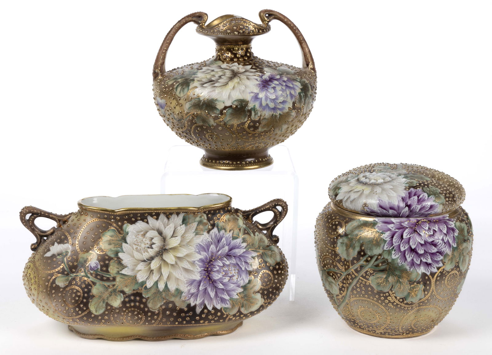 JAPANESE NIPPON PORCELAIN FLORAL MOTIF ARTICLES, LOT OF THREE: JAPANESE NIPPON PORCELAIN FLORAL MOTIF ARTICLES, LOT OF THREE, each featuring polychrome hand-painted beaded chrysanthemum designs with gilt decorations depicting beautiful purple and white flowers, c