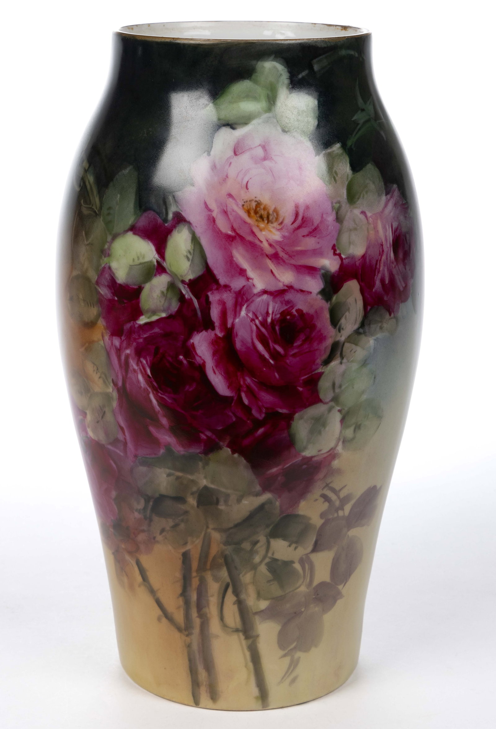 FRENCH LIMOGES PORCELAIN HAND-PAINTED VASE: FRENCH LIMOGES PORCELAIN HAND-PAINTED VASE, having polychrome hand-painted polychrome design featuring a vibrant rose bouquet to front and a single rose with leafy stems to reverse and gold-painted ri
