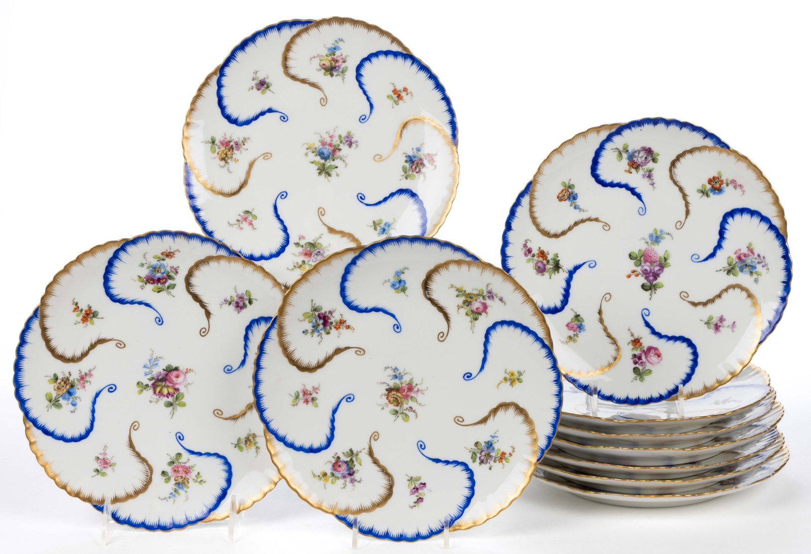 FRENCH LIMOGES PORCELAIN HAND-PAINTED PLATES, LOT OF TEN: FRENCH LIMOGES PORCELAIN HAND-PAINTED PLATES, LOT OF TEN, each having scattered bright polychrome sprigs and floral bouquets with blue and gilt scrolled rim designs. Each having red-printed "JACQUEL. 