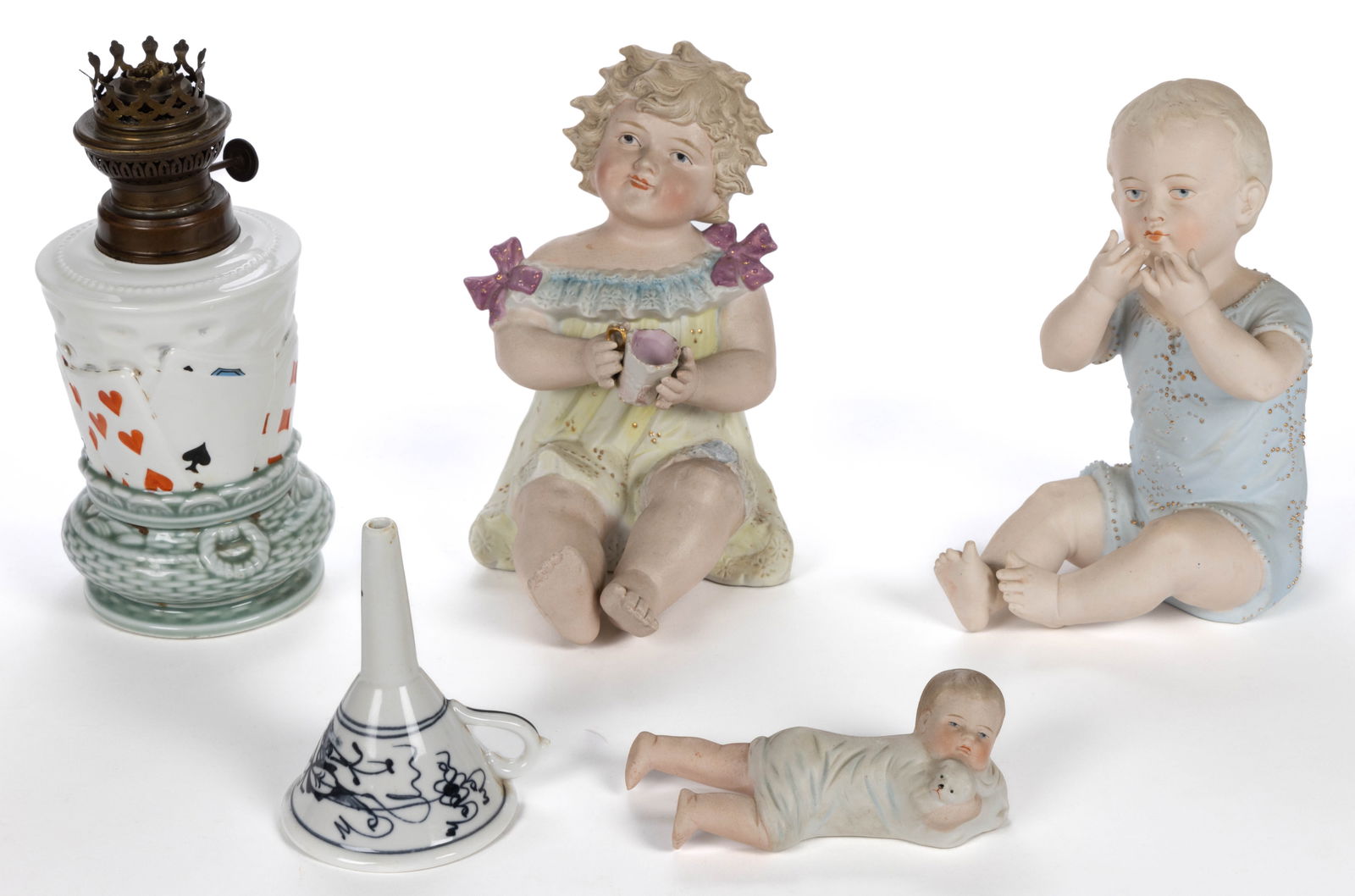 GERMAN PORCELAIN HAND-PAINTED ARTICLES, LOT OF FIVE: GERMAN PORCELAIN HAND-PAINTED ARTICLES, LOT OF FIVE, comprising three piano babies including two sitting examples and one featuring a child laying on their stomach with an arm wrapped around a puppy,