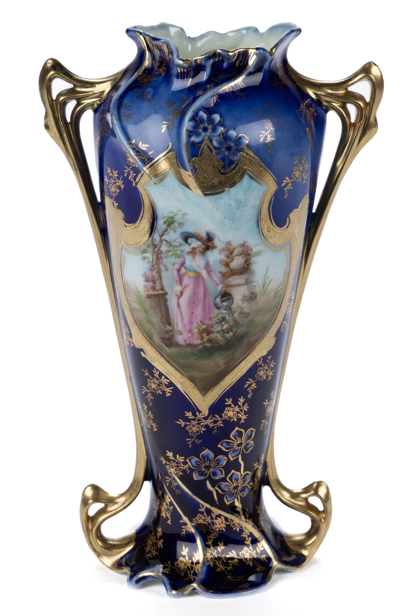 ROYAL VIENNA PORCELAIN COBALT SCENIC MOTIF VASE: ROYAL VIENNA PORCELAIN COBALT SCENIC MOTIF VASE, RVG Mold 1, having a medallion with polychrome transfer image depicting Lady Watering Flowers with dark blue surround, delicate embossed flowers, and a
