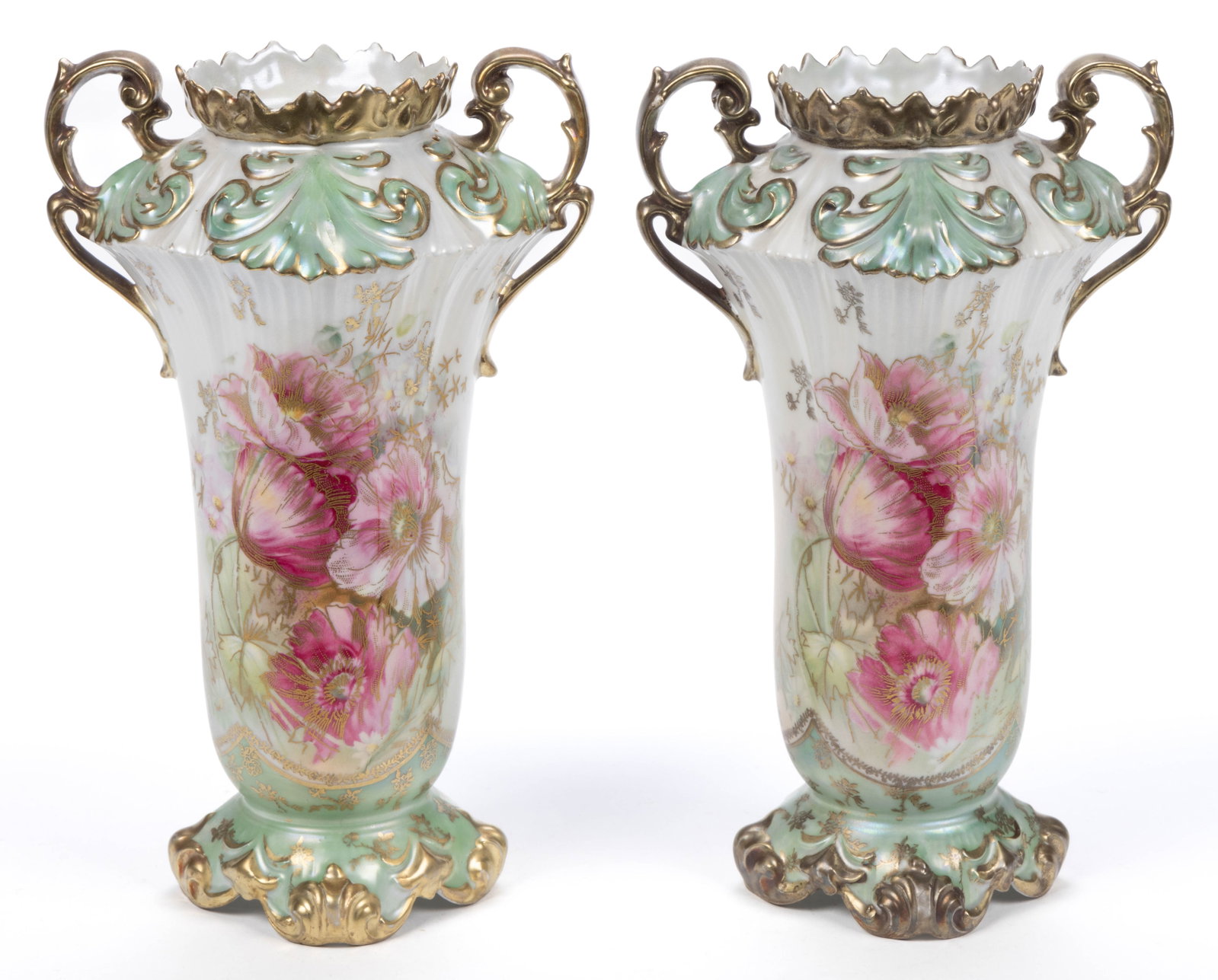 R.S. PRUSSIA PORCELAIN FLORAL MOTIF VASE PAIR: R.S. PRUSSIA PORCELAIN FLORAL MOTIF VASE PAIR, RSP Mold 609, double-handled, each having molded light green "Fleur-de-lys" to shoulder with polychrome transfer gilt-accented poppy design to front and 