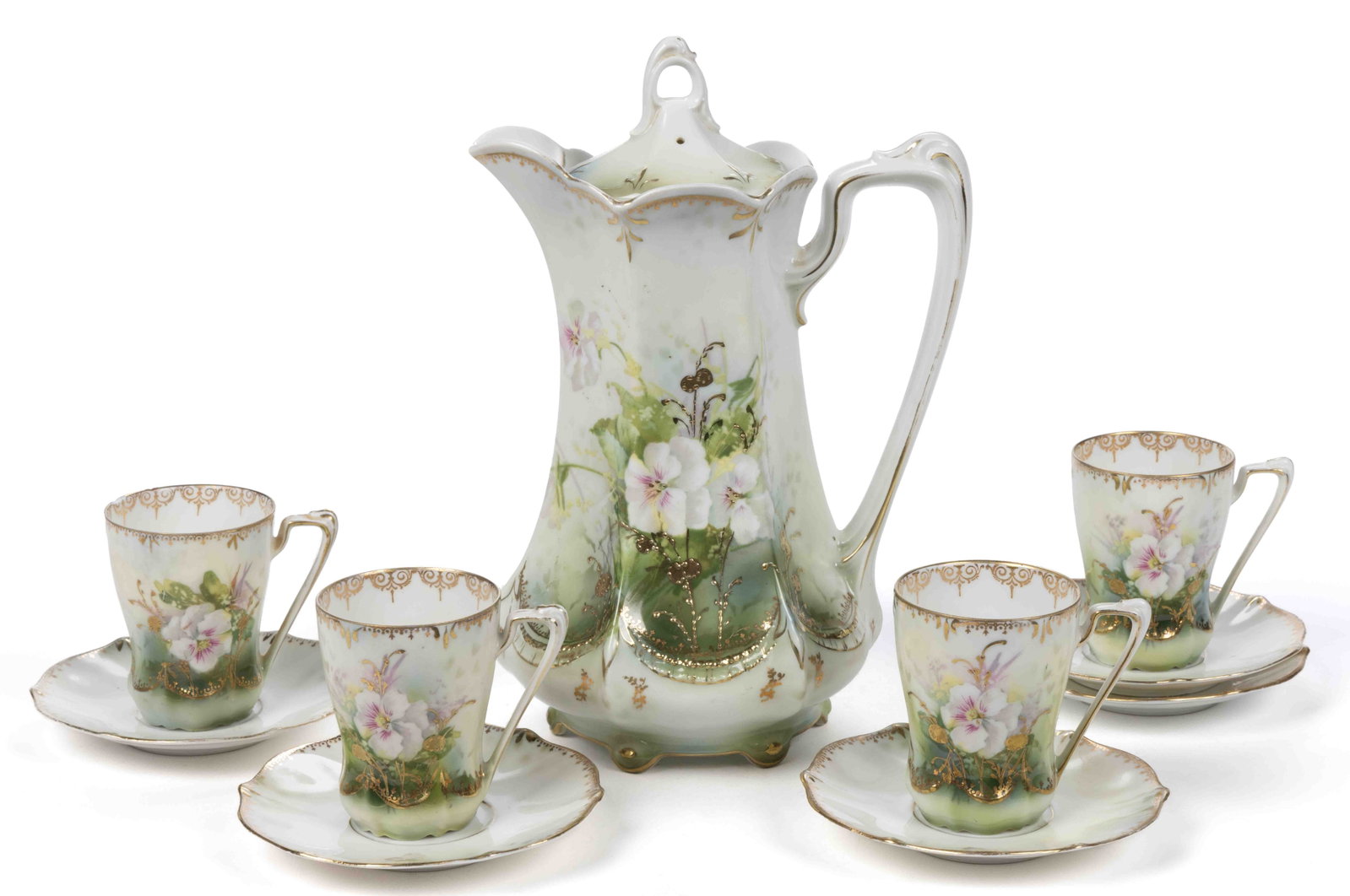 R.S. PRUSSIA PORCELAIN FLORAL MOTIF TEN-PIECE CHOCOLATE SET: R.S. PRUSSIA PORCELAIN FLORAL MOTIF TEN-PIECE CHOCOLATE SET, RSP Mold 655, each having polychrome transfer pansy design on light green ground with hand-painted gilt accents, comprising a chocolate pot
