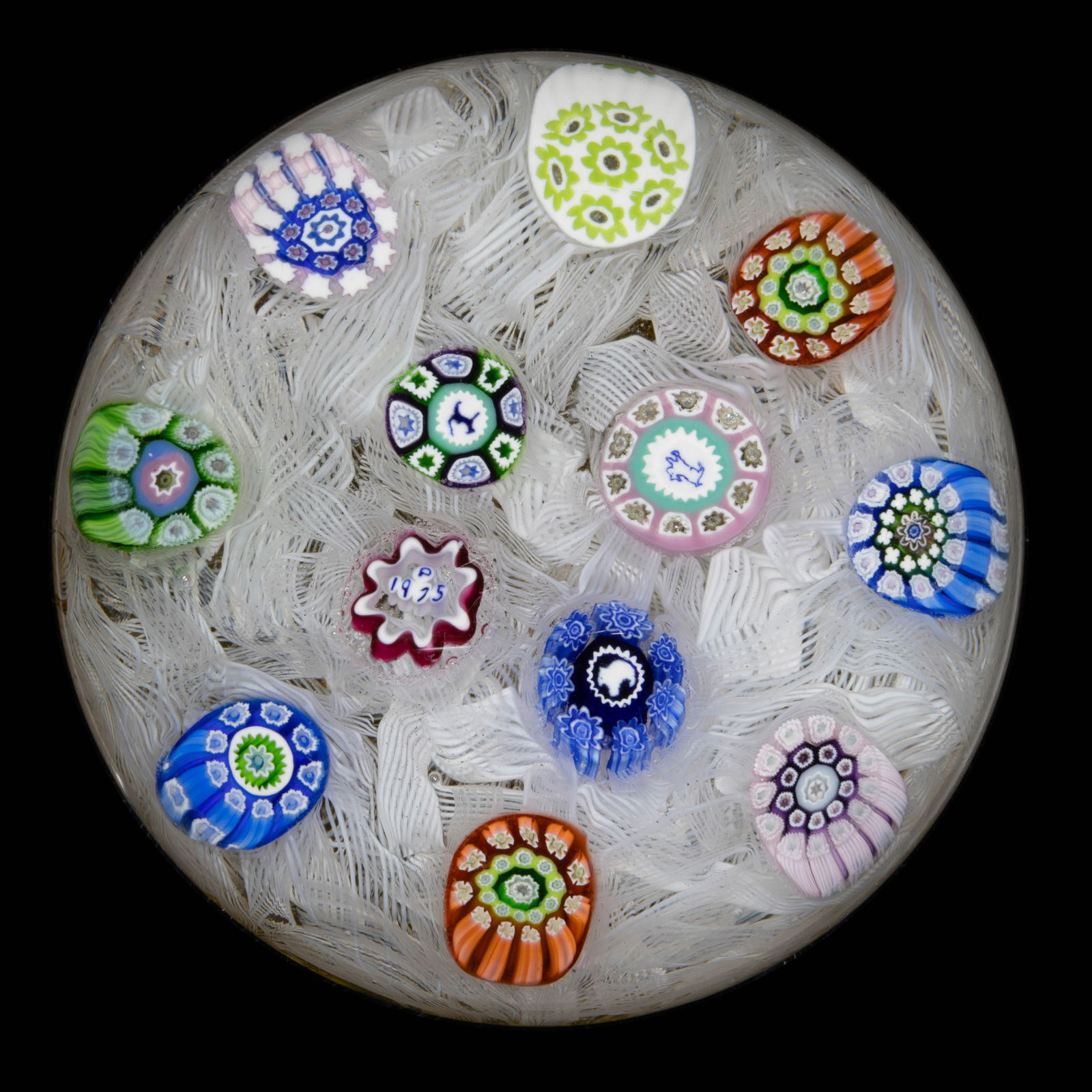 VINTAGE PERTHSHIRE SPACED SILHOUETTE MILLEFIORI ART GLASS PAPERWEIGHT: VINTAGE PERTHSHIRE SPACED SILHOUETTE MILLEFIORI ART GLASS PAPERWEIGHT, comprising 12 millefiori canes including with three interior canes being a rabbit, bear, and a cat silhouette cane, remainder bei