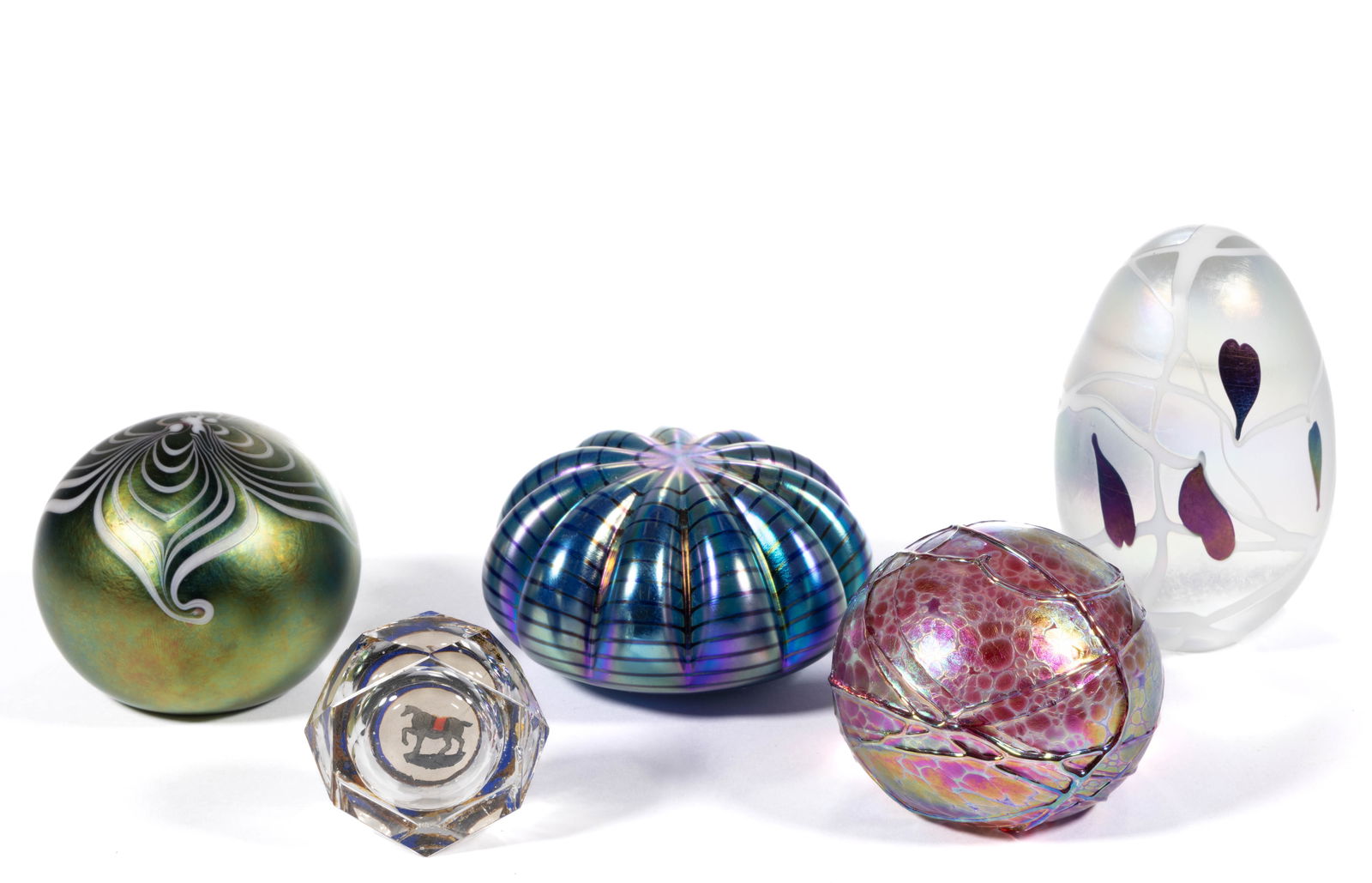 ASSORTED ANTIQUE AND CONTEMPORARY STUDIO ART GLASS PAPERWEIGHTS, LOT OF FIVE: ASSORTED ANTIQUE AND CONTEMPORARY STUDIO ART GLASS PAPERWEIGHTS, LOT OF FIVE, including an antique Gillinder moving horse example, a Terry Crider, and an Eickholt. Circa 1876 and fourth quarter 20th c