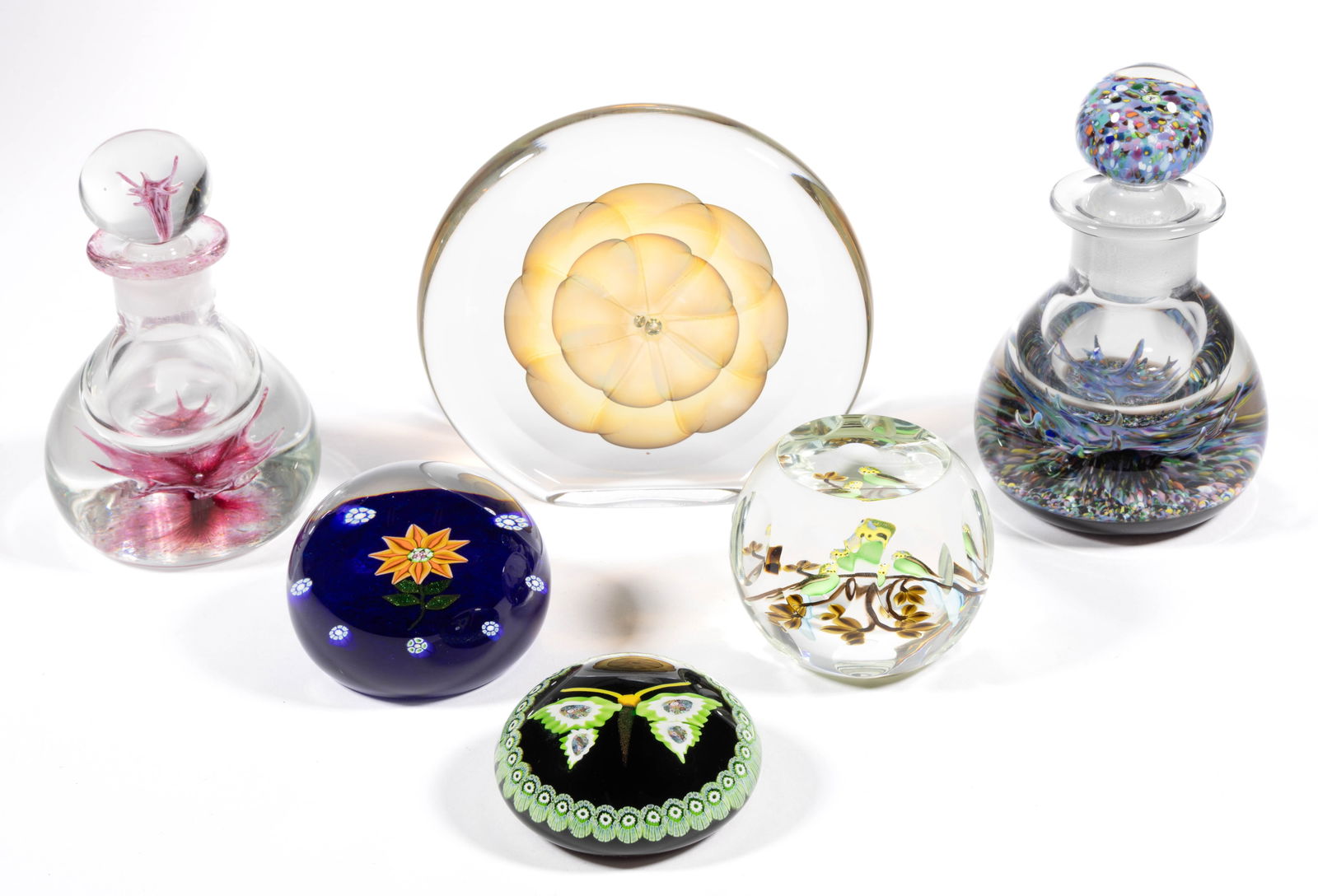 ASSORTED ART GLASS PAPERWEIGHT ARTICLES, LOT OF SIX: ASSORTED ART GLASS PAPERWEIGHT ARTICLES, LOT OF SIX, including William Manson butterfly, two Selkirk fountain inkwells, and a Scottish double clematis. Various makers. 20th century. 1 1/2" to 5 1/2" H