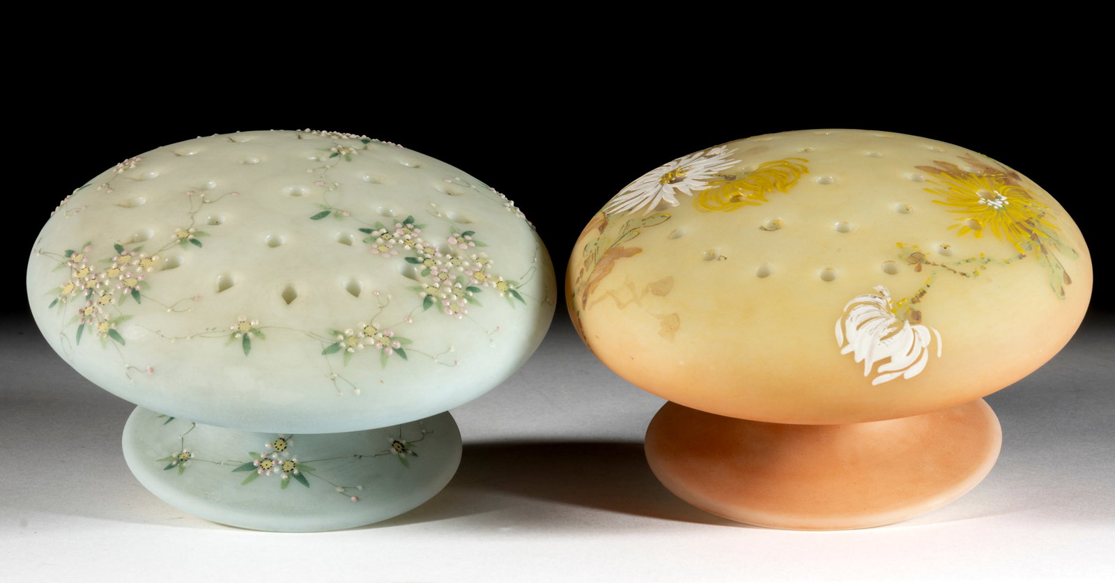 MT. WASHINGTON NO. 535 MUSHROOM FLOWER HOLDERS, LOT OF TWO: MT. WASHINGTON NO. 535 MUSHROOM FLOWER HOLDERS, LOT OF TWO, opaque white satin surface with polychrome-enamel floral decorations, comprising an example with Chrysanthemum (spider mums) decoration over