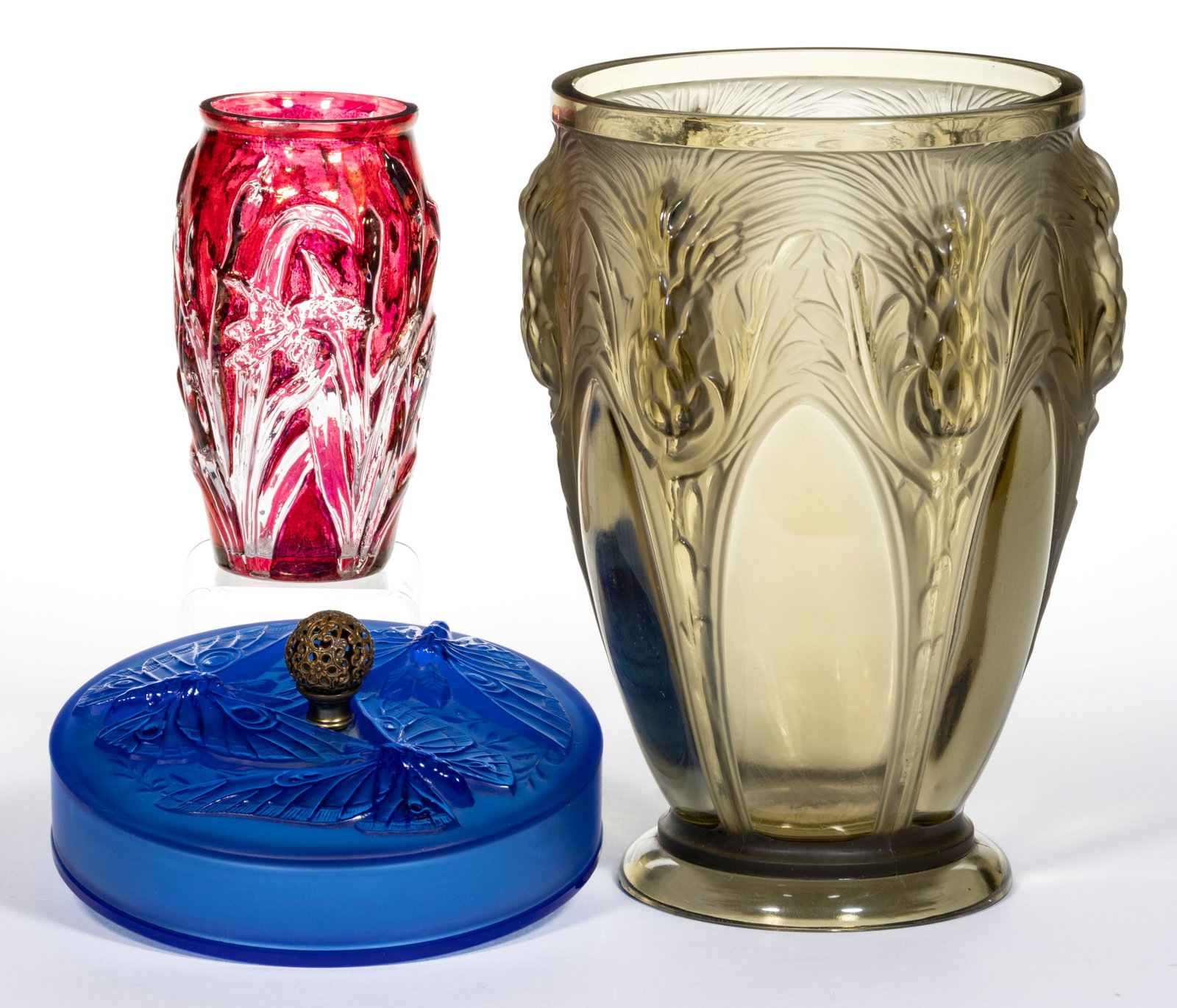 VERLYS AND CONSOLIDATED ART GLASS ARTICLES, LOT OF THREE: VERLYS AND CONSOLIDATED ART GLASS ARTICLES, LOT OF THREE, comprising a blue Butterfly covered box with filigree brass finial and a topaz Thistle vase, each signed Verlys; and a red-stained colorless C