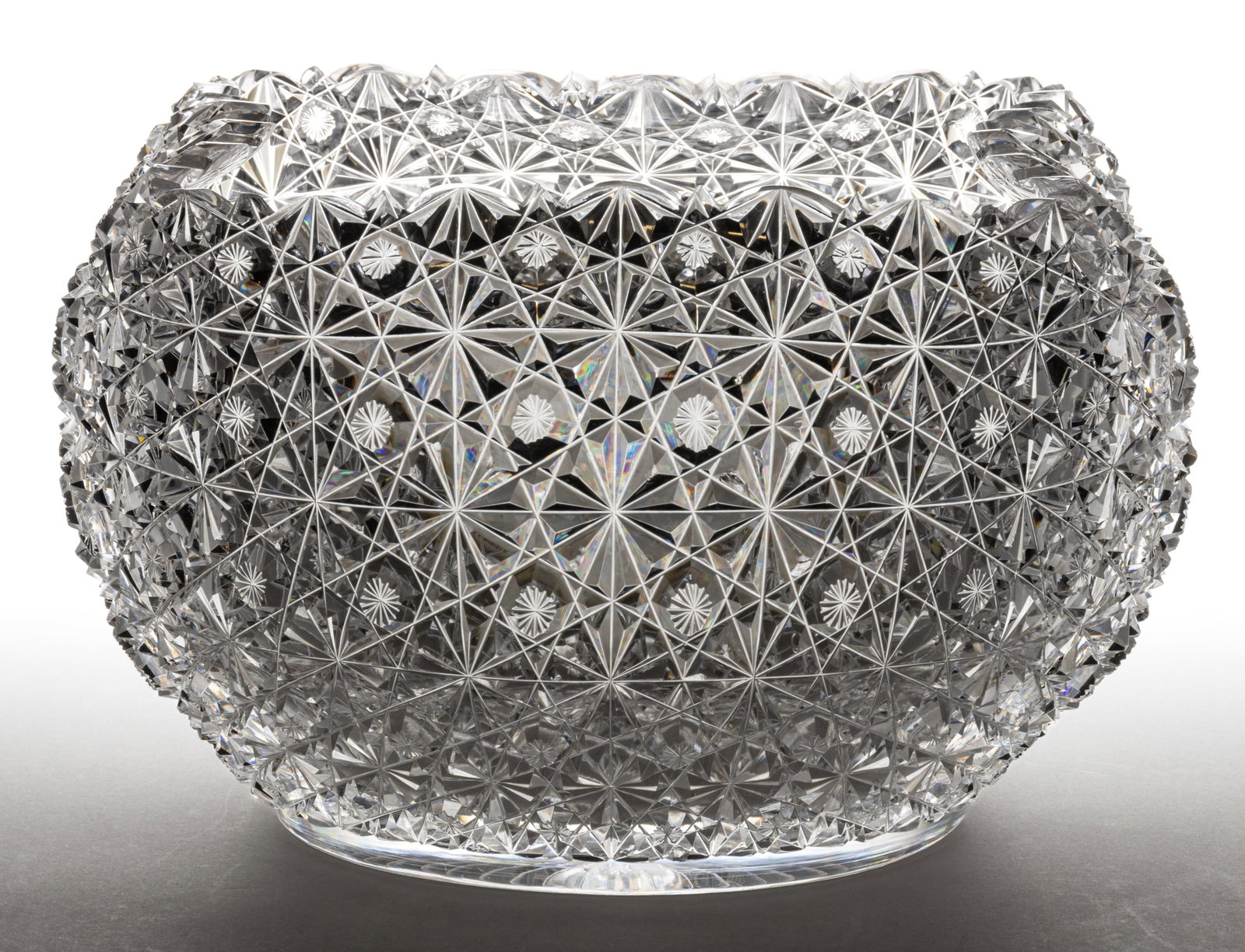 AMERICAN BRILLIANT CUT GLASS "RUSSIAN (CANTERBURY)" PATTERN CENTERPIECE BOWL: AMERICAN BRILLIANT CUT GLASS "RUSSIAN (CANTERBURY)" PATTERN CENTERPIECE BOWL, colorless, hemispherical shape with four-corner inwardly-rolled rim, cut in a Russian-type pattern with starred button ("C