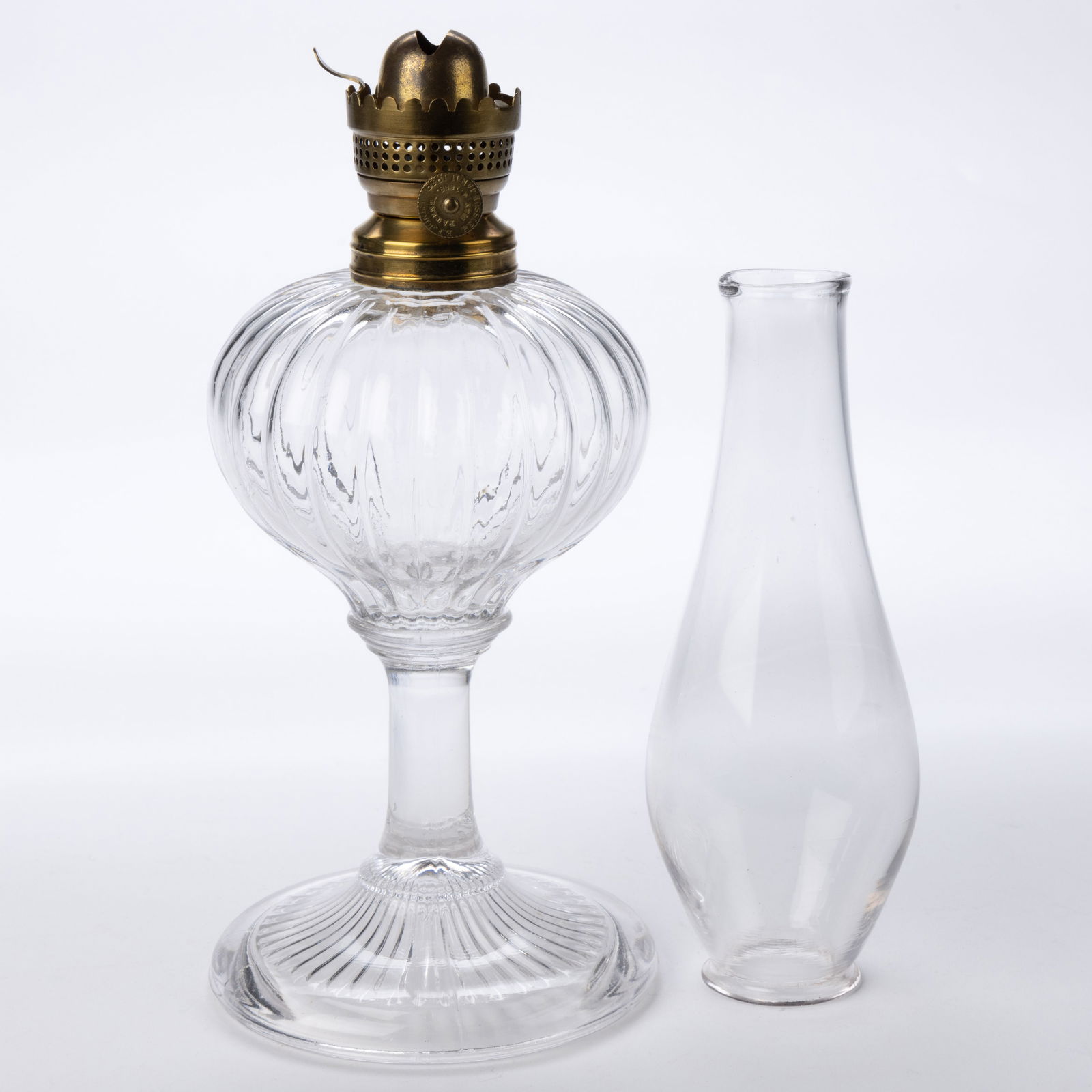 E. F. JONES NO. 0 LIP BURNER AND CHIMNEY SETUP: E. F. JONES NO. 0 LIP BURNER AND CHIMNEY SETUP, thumbwheel marked "E. F. JONES PATENT MAY 4 1858. / REISSUE JAN. 11 1859", with a Merrill's air director, marked "R. S. MERRILL'S PATENT. JUNE 14. 1859.