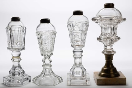 PRESSED AND BLOWN-MOLDED ASSORTED PATTERNED KEROSENE / FLUID STAND LAMPS, LOT OF FOUR
