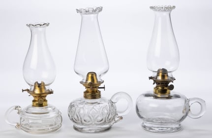 ASSORTED PATTERNED KEROSENE FINGER LAMPS, LOT OF THREE