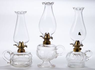 ASSORTED PATTERNED KEROSENE FINGER LAMPS, LOT OF THREE