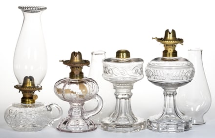 ASSORTED PATTERNED KEROSENE LAMPS, LOT OF FOUR