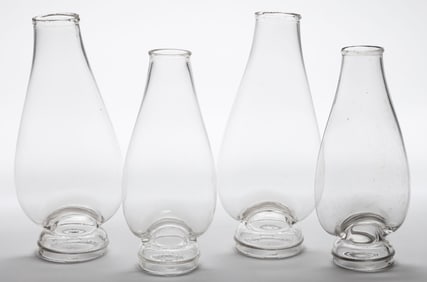 MOLD-BLOWN PATENTED FOWLER GLASS NO. 0 AND NO. 1 TABBED CHIMNEYS, LOT OF FOUR