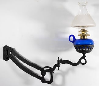 CAST-IRON RATCHET ADJUSTABLE BRACKET AND COLORED GLASS FONT KEROSENE BRACKET LAMP