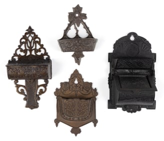 ASSORTED CAST-IRON WALL-MOUNT MATCH HOLDERS, LOT OF FOUR
