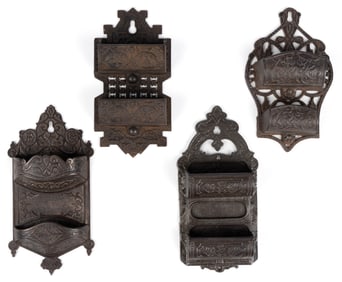 ASSORTED CAST-IRON WALL-MOUNT MATCH HOLDERS, LOT OF FOUR