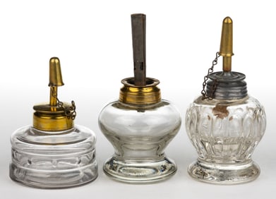 ASSORTED PATTERNED MINIATURE AND SPARKING KEROSENE LAMPS, LOT OF THREE