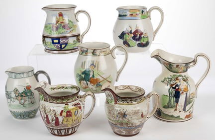 BUFFALO POTTERY TRANSFER-DECORATED JUGS / PITCHERS, LOT OF SEVEN