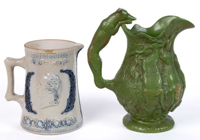 ASSORTED EMBOSSED CERAMIC JUGS / PITCHERS, LOT OF TWO