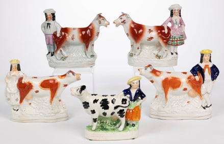 ENGLISH STAFFORDSHIRE HAND-PAINTED CERAMIC FIGURAL COW CREAMERS, LOT OF FIVE