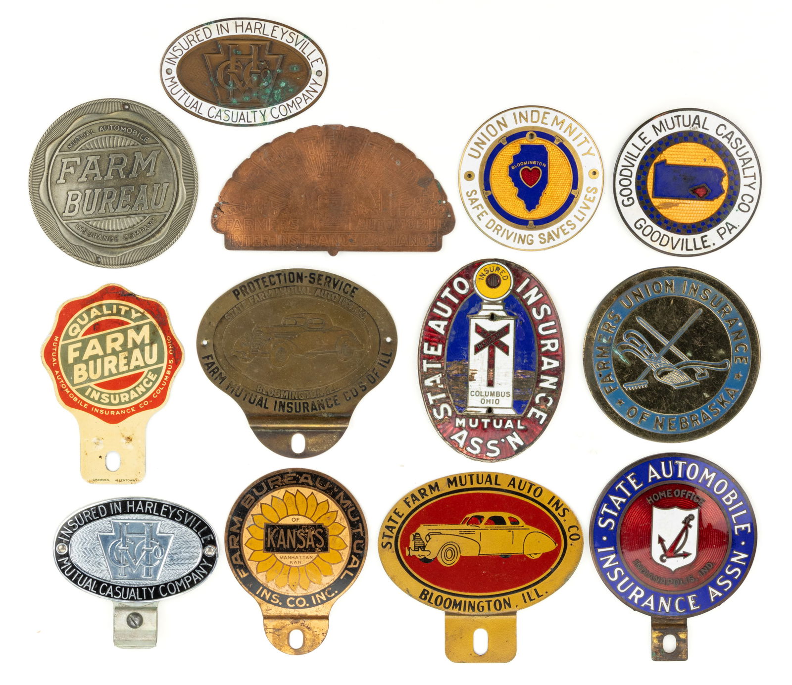 ASSORTED LICENSE PLATE / TAG TOPPERS AND AUTOMOBILE INSURANCE EMBLEMS, LOT OF 13 (1 of 1)