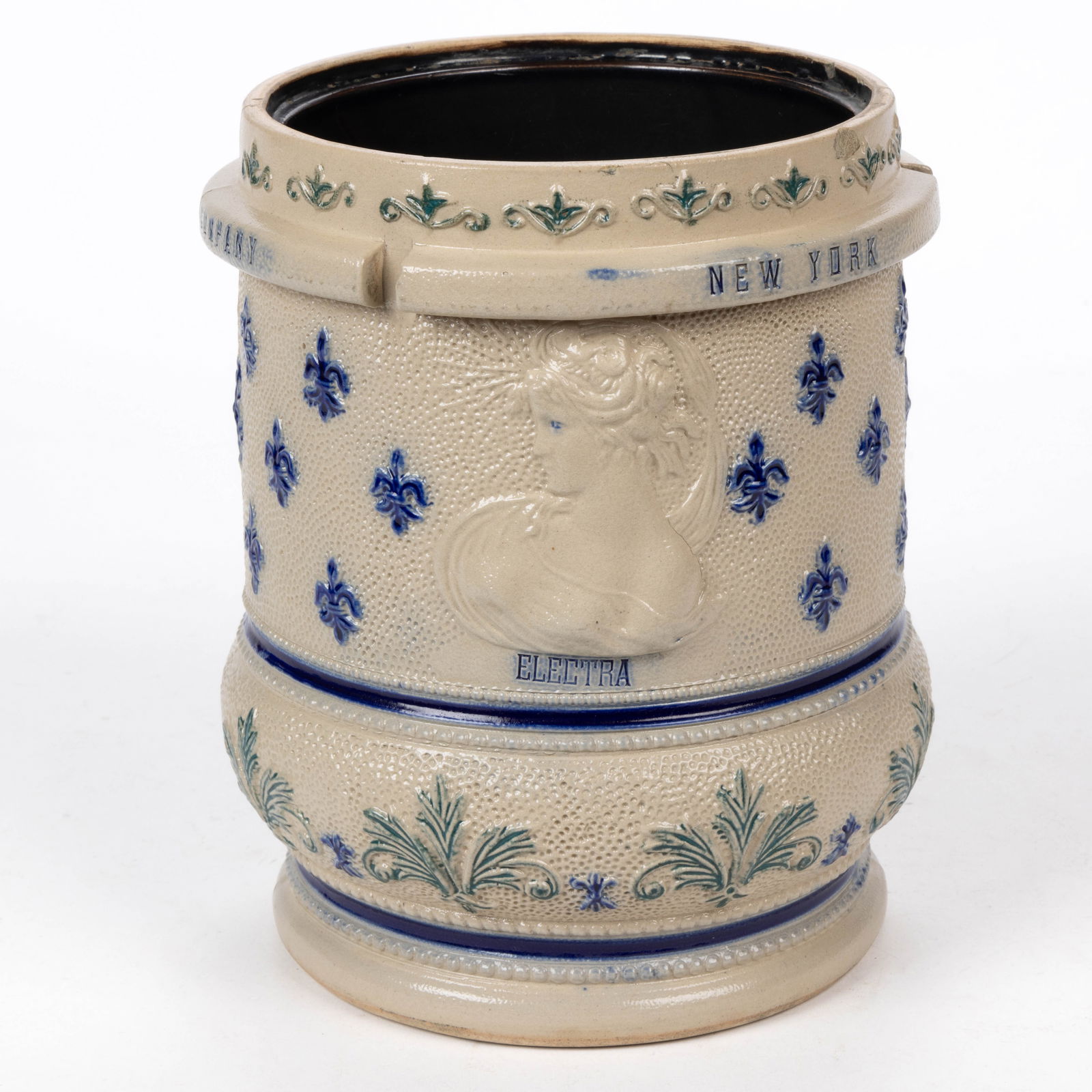 AMERICAN WHITE'S POTTERY, UTICA, NEW YORK MOLDED STONEWARE ADVERTISING BATTERY JAR: AMERICAN WHITE'S POTTERY, UTICA, NEW YORK MOLDED STONEWARE ADVERTISING BATTERY JAR, salt-glazed, cylindrical form having cobalt and green decorations and Albany-slip glazed interior, each sid