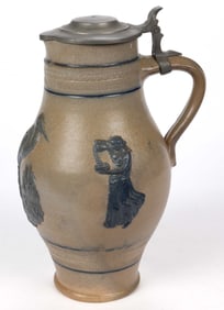 AMERICAN WHITE'S POTTERY, UTICA, NEW YORK MOLDED STONEWARE BIRD MOTIF PITCHER